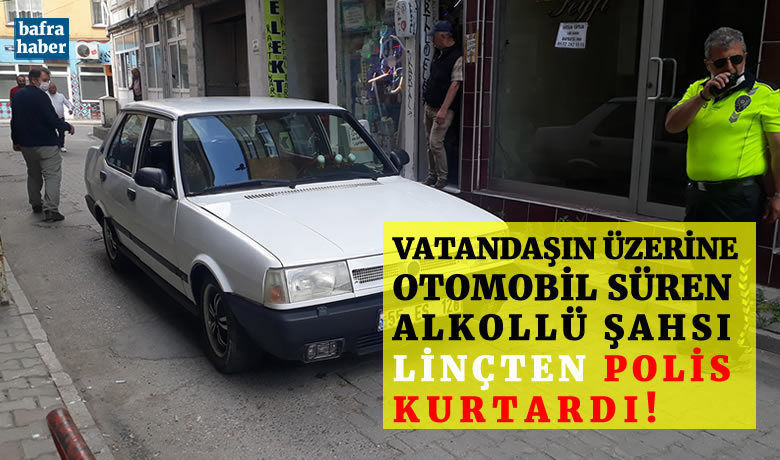 Vatandaşın Üzerine Araç SürenŞahsı Linçten Polis Kurtardı! - Samsun’un Bafra İlçesinde gün içerisinde birçok kez trafiği tehlikeye düşürdü ihbarı yapılan otomobil polis tarafından Güven Sokak’ta durduruldu, çevredeki vatandaşların darp etmek istediği sürücüyü polis kurtardı.