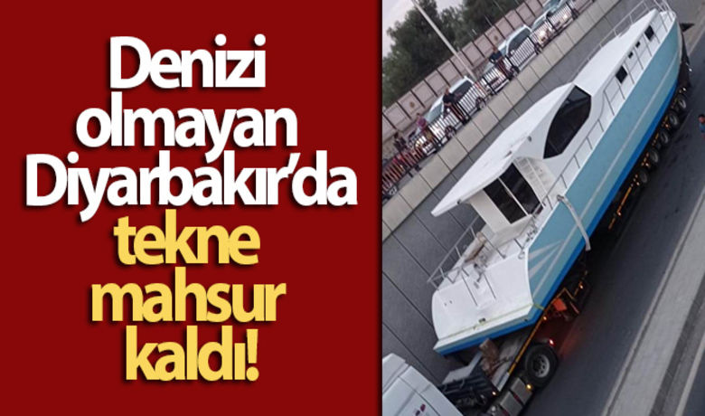 Denizi olmayan Diyarbakır'da tekne mahsur kaldı - Diyarbakır’da tır üstünde bulunan bir tekne, alt geçitte mahsur kaldı.BUGÜN NELER OLDU?
