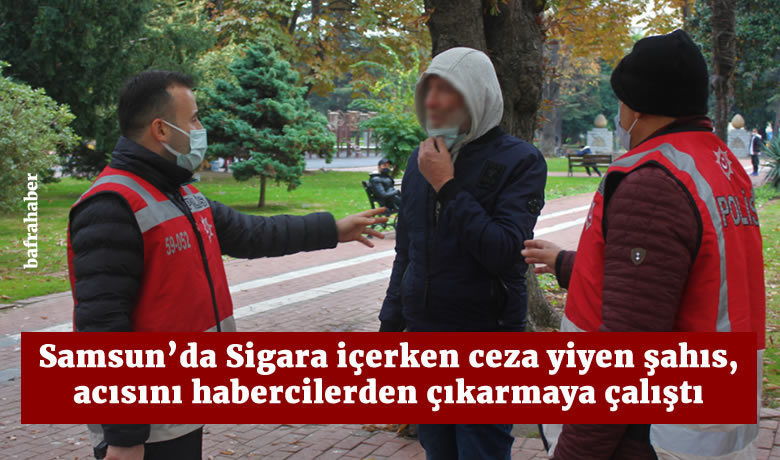 Sigara içerken ceza yedi,acısını habercilerden çıkarmaya çalıştı