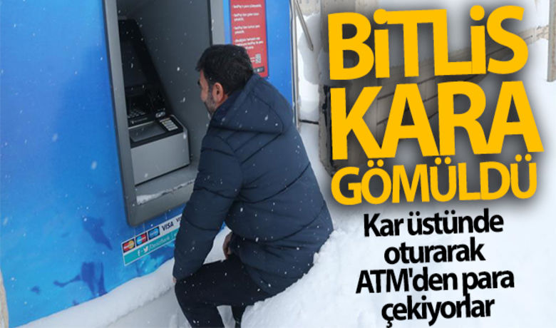 Bitlis kara gömüldü! Karüstünde oturarak ATM'den para çekiyorlar - Bitlis'te bir haftadır aralıklarla devam eden kar yağışı sonucu kar kalınlığı kent merkezinde 1,5, yüksek kesimlerde ise 2,5 metreyi aştı. HABERİN VİDEOSU İÇİN TIKLAYINIZ