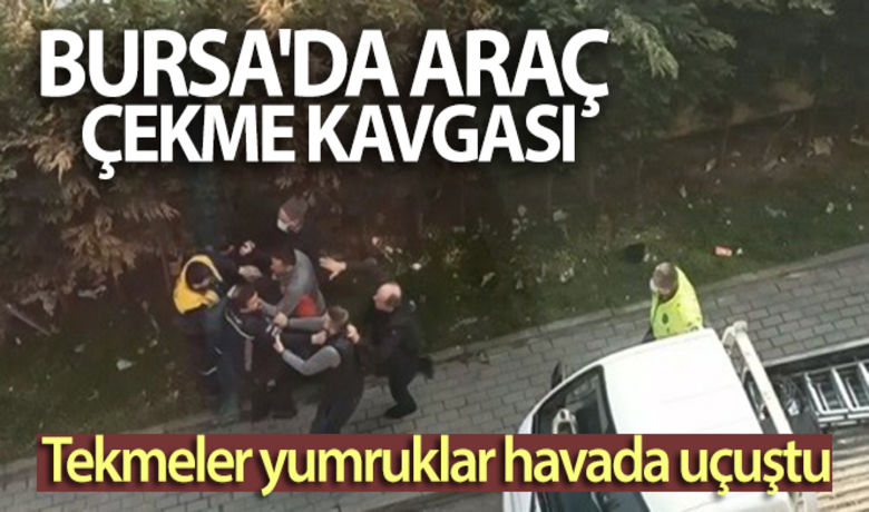 Bursa'da araç çekme kavgası kamerada - Bursa'da hatalı park sebebiyle kamyonetleri çekilen bir grup, polis memurları ve görevlilere saldırdı. Tekme ve yumrukların havada uçuştuğu kavga kameralara yansıdı.