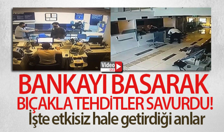 Taksim'de banka şubesine giren bıçaklısaldırganın etkisiz hale getirdiği anlar kamerada - Taksim’de elinde bıçakla bir banka şubesine girerek görevliye tehditler savuran madde bağımlısı saldırganın önce banka görevlisi tarafından engellendiği ardından trafik polisi tarafından etkisiz hale getirildiği anlar güvenlik kameralarına yansıdı. Şahsın hastanede tedavisinin sürdüğü öğrenildi.	Polisin saldırganı etkisi hale getirdiği an