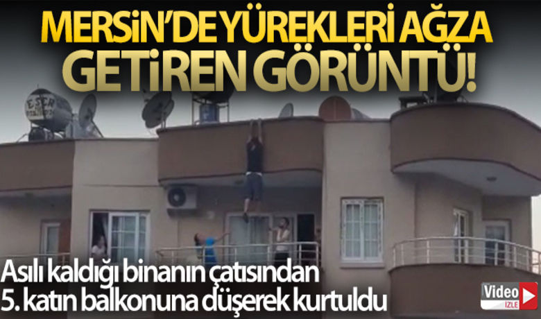 Mersin'de yürekleri ağza getiren görüntü - Mersin'de henüz bilinmeyen bir nedenle 5 katlı binanın çatısına çıkan bir şahıs, bir süre asılı kaldığı binanın çatısından 5. katın balkonuna düşerek kurtuldu. Olay anı bir vatandaşın cep telefonu kamerasıyla saniye saniye kaydedilerek sosyal medyada yayınlandı.