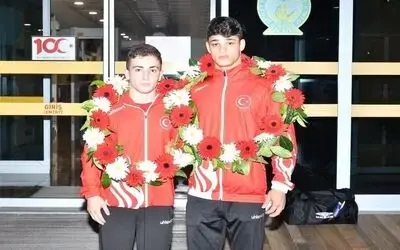 Şampiyonlara çiçekli karşılama
