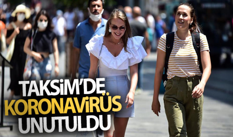 Taksim'de koronavirüs unutuldu - Yerli ve yabancı turistlerin uğrak yeri olan Taksim Meydanı ve İstiklal Caddesi'nde birçok vatandaş ve turistlerin maske takmadığı dikkat çekti.