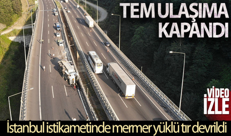 Mermer yüklü tır devrildi, TEM ulaşıma kapandı - TEM Otoyolu Bolu Dağı tünel çıkışı İstanbul istikametinde mermer yüklü tır devrildi. Tır sürücüsünün yaralandığı kaza sebebiyle yolun İstanbul istikametine ulaşım kapandı.