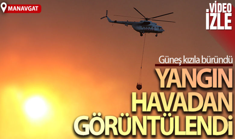 Manavgat'taki orman yangını havadangörüntülendi, gökyüzü dumana büründü - Antalya’nın Manavgat ilçesinde çıkan ve 4 mahalleye sıçrayan yangını söndürme çalışmaları devam ediyor. Gökyüzünün dumanla kaplandığı, güneşin adeta kızıla büründüğü yangın alanı havadan drone ile görüntülendi. Çalışmalara havadan 19 helikopter destek veriyor.