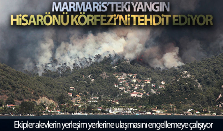 Marmaris'teki yangın HisarönüKörfezi'ni tehdit ediyor - Muğla’nın Marmaris ilçesinde devam eden orman yangını Hisarönü Körfezi’nde büyümeye devam ediyor. Alevlerin yerleşim yerlerine sıçramaması için çalışmalar yoğun şekilde sürüyor.