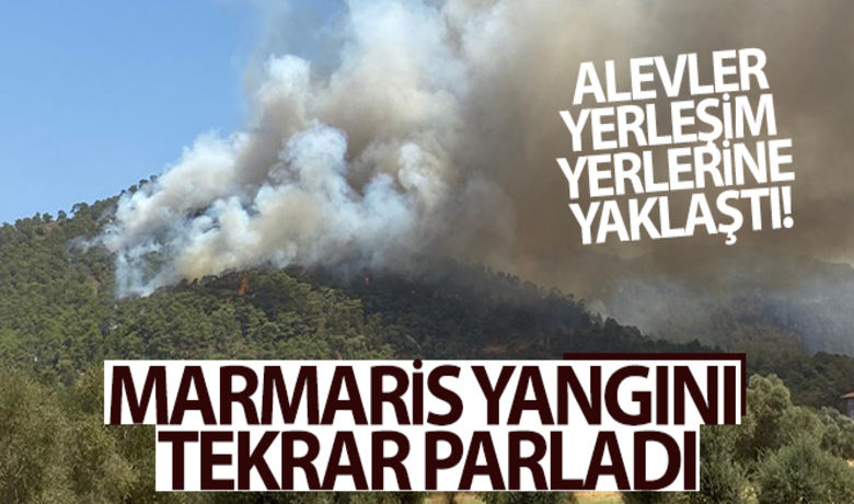Marmaris yangını tekrar parladı,alevler Hisarönü'nde yerleşim yerlerine yaklaştı - Muğla’nın Marmaris ilçesinde devam eden orman yangını rüzgarın etkisi ile tekrar parladı. Alevler Hisarönü Mahallesi’ne doğru ilerleyerek bölgedeki evleri tehdit etmeye başladı.