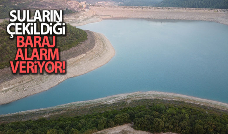 Suların çekildiği Mehmetli Barajı alarm veriyor - Osmaniye’nin Sumbas ilçesinde bulunan Mehmetli Barajı suların çekilmesiyle birlikte kuruma alarmı vermeye başladı. Tarımsal faaliyetlerde kullanılması için yaklaşık 50 yıl önce inşa edilen baraj, geçen yıl Temmuz ayında maksimum yüzde 37 doluluk oranına ulaşırken drone ile havadan görüntülenen gövde kısmında çekilen sular kuraklığın boyutunu gözler önüne serdi.