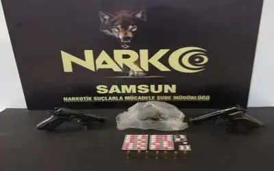 İş yerinde tabanca ve uyuşturucu ile yakalandı

