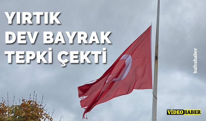 Manset bafra daki yirtik dev bayrak tepki cekti