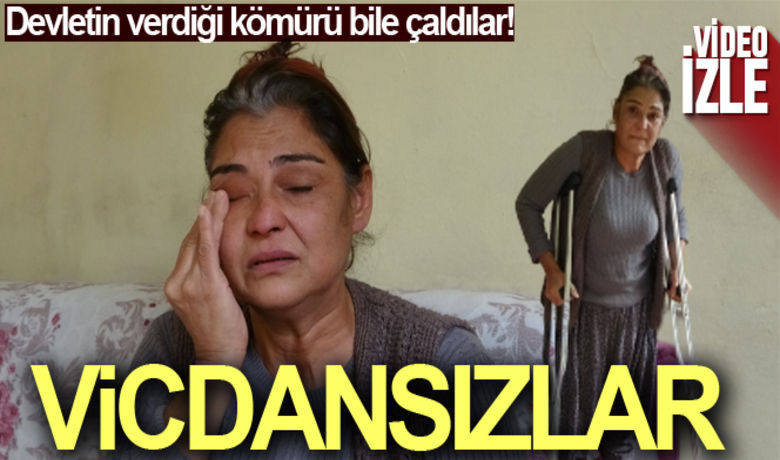 Adana'da hırsızlar engelli kadını koltukdeğneği ve soğuğa mahkum etti - Adana’nın Kozan ilçesinde bir eve giren hırsızlar çocuk felci nedeniyle yürüyemeyen engelli kadının akülü sandalyesinin şarj aletini ve devletin yardım olarak verdiği 20 torba kömürü çaldı.