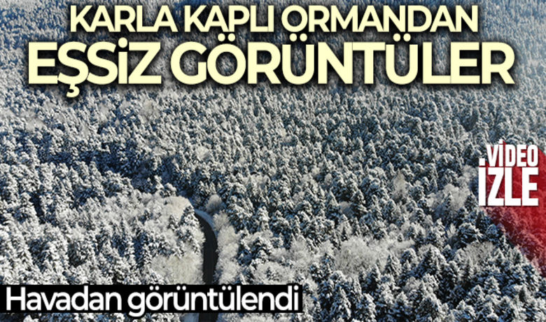 Bolu'nun karla kaplıormanları havadan görüntülendi - Bolu’da, kar yağışıyla birlikte beyaz örtüyle kaplanan dağlar havadan görüntülendi. Kar denizini andıran manzaranın oluştuğu ormanların kartpostallık görüntüleri mest etti.
