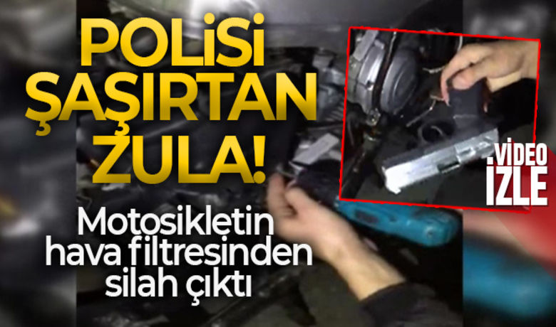İstanbul'da polisi şaşırtan zula:Motosikletin hava filtresinden silah çıktı - Sarıyer’de motosikletli polis timleri, yol kenarındaki bir motosikletin yanında bekleyen şahısları görünce şüphelenerek arama yaptı. Motosikletin hava filtresini şarjlı matkapla açan polis, içerisine saklanmış iki adet tabanca ele geçirdi.