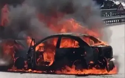 Kaza sonrası alev topuna dönen otomobilden karı-koca son anda kurtarıldı
