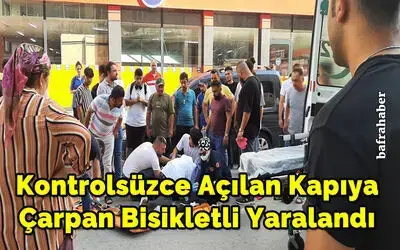 Kontrolsüzce Açılan Kapıya Çarpan Bisikletli Yaralandı