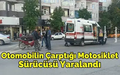 Otomobilin çarptığı motosiklet sürücüsü yaralandı