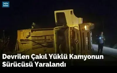 Devrilen Çakıl Yüklü Kamyonun Sürücüsü Yaralandı