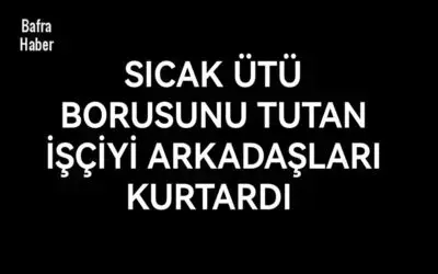 Sıcak ütü borusunu tutan işçiyi  arkadaşları kurtardı