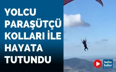 Yolcu paraşütçü kolları ile hayata tutundu 
