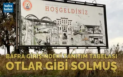 Bafra girişindeki tanıtım tabelası otlar gibi solmuş
