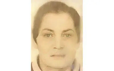 Tarlada ağaca asılı halde bulundu
