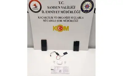Ehliyet sınavına düzenekle giren kadın yakalandı
