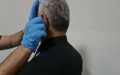 Ehliyet sınavında kopya düzeneğiyle yakalandılar
